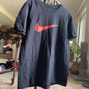 Black Nike Tee with red Nike sign